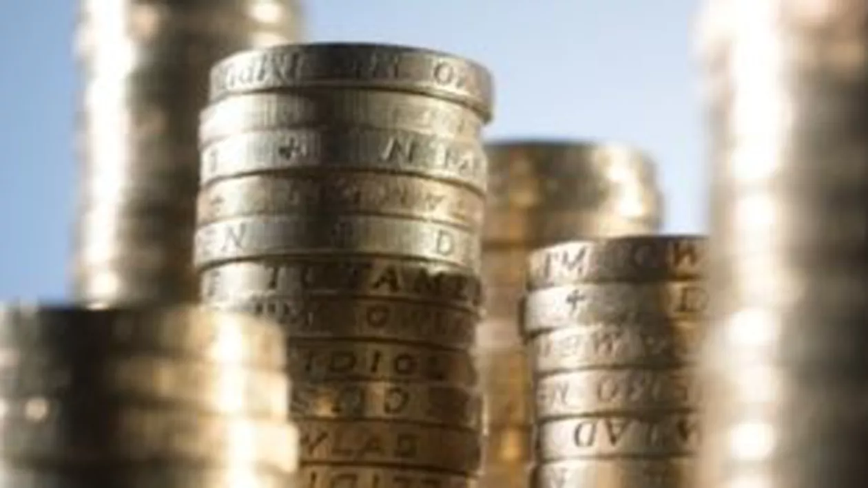 Economia Marii Britanii a scăzut în ultimul trimestru din 2010, în mod neaşteptat