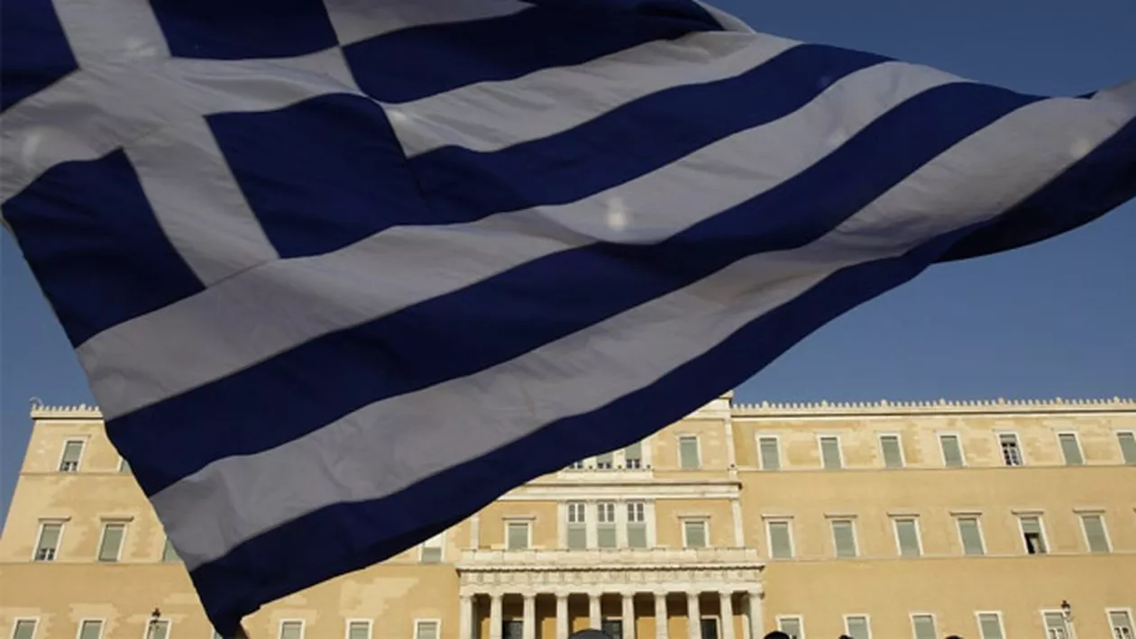 Grecia va reveni pe creștere economică în 2014, după 6 ani de recesiune
