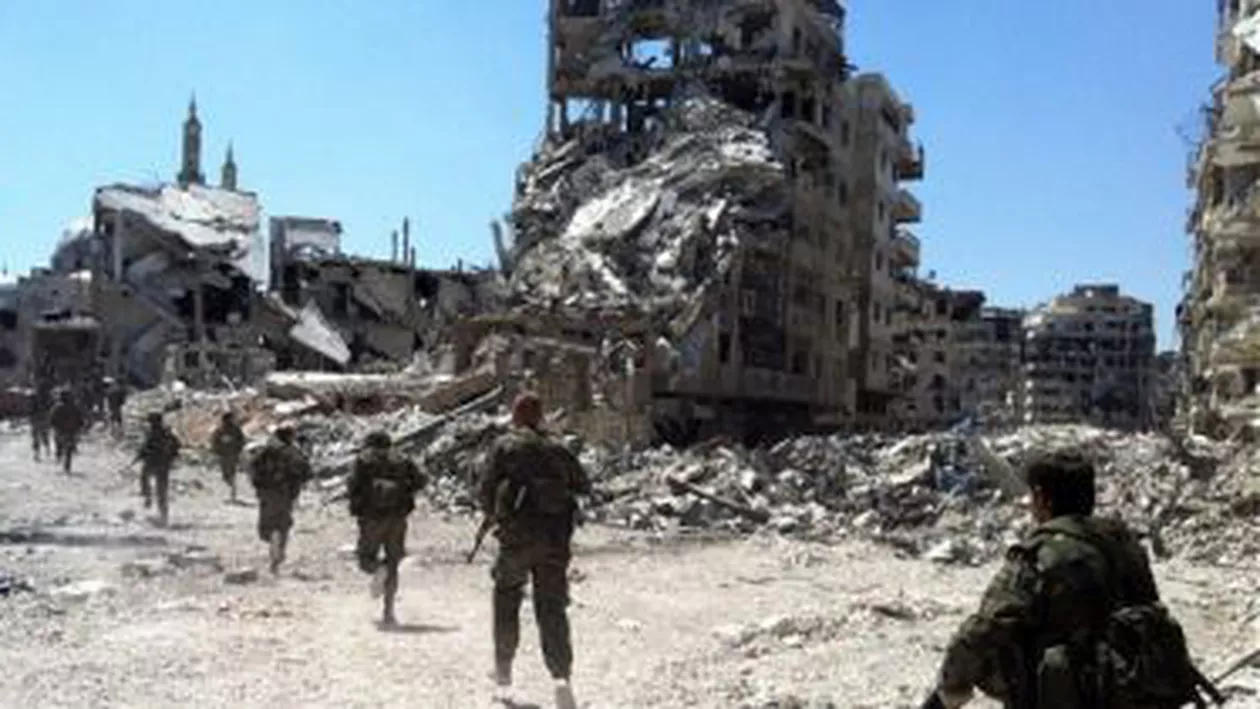 Regimul Bashar Al-Assad a autorizat femeile și copiii să părăsească Homs