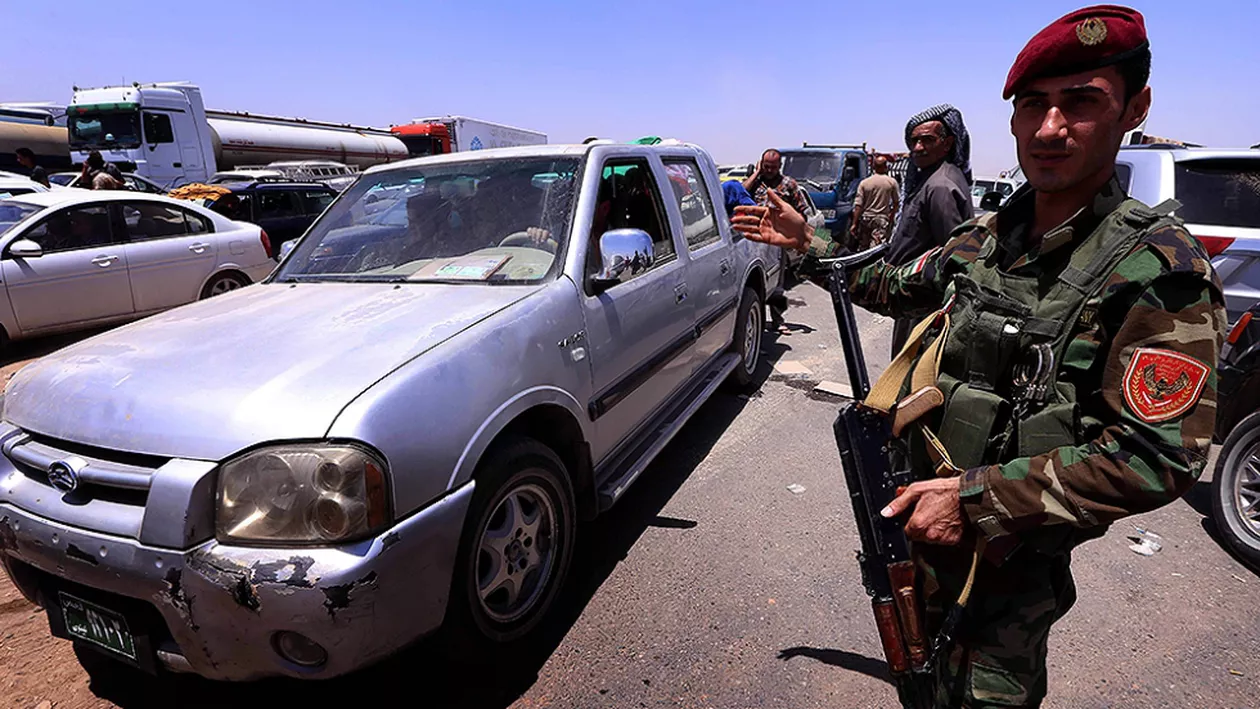 Zeci de persoane, inclusiv diplomaţi, ostatici la consulatul Turciei din Mosul