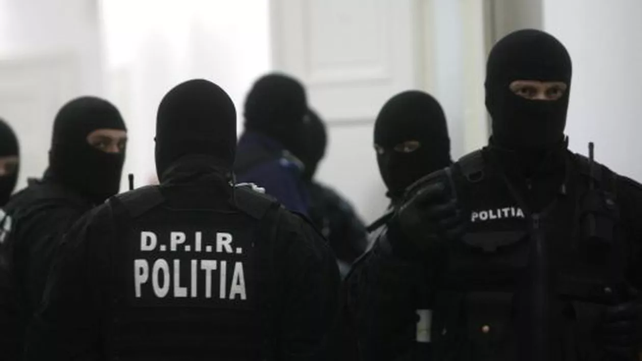 Percheziţii la o grupare suspectată de infracţiuni economice în domeniul auditării firmelor străine