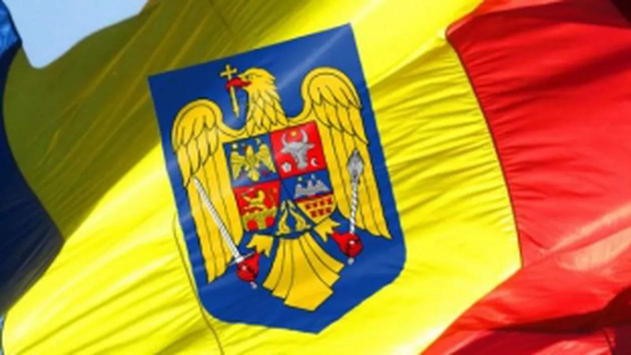 Drapelul României s-ar putea îmbogăţi în curând cu o coroană care va fi plasată deasupra stemei: Deputaţii jurişti au votat un proiect în acest sens