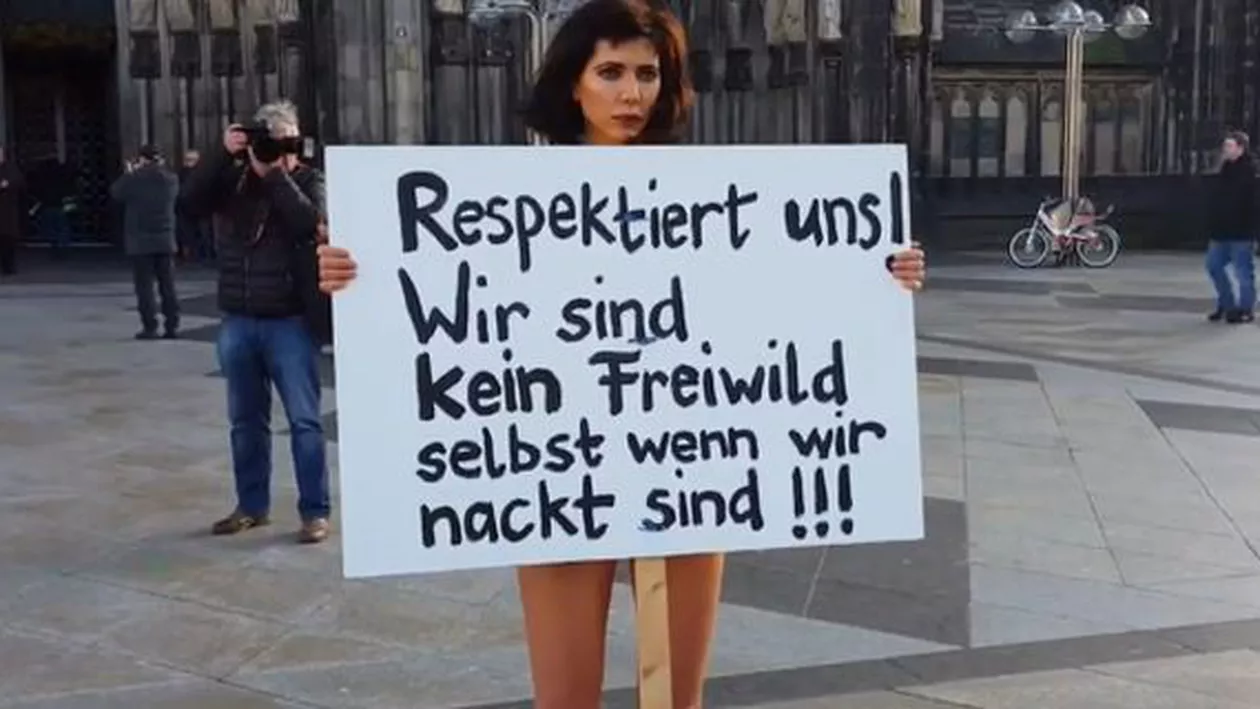 O celebră artistă a umblat goală pe străzi în Koln în semn de protest față de agresiunile sexuale (VIDEO)