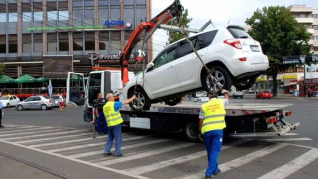 Veşti proaste pentru şoferi: Guvernul va elabora un regulament de ridicare a mașinilor parcate neregulamentar (VIDEO)