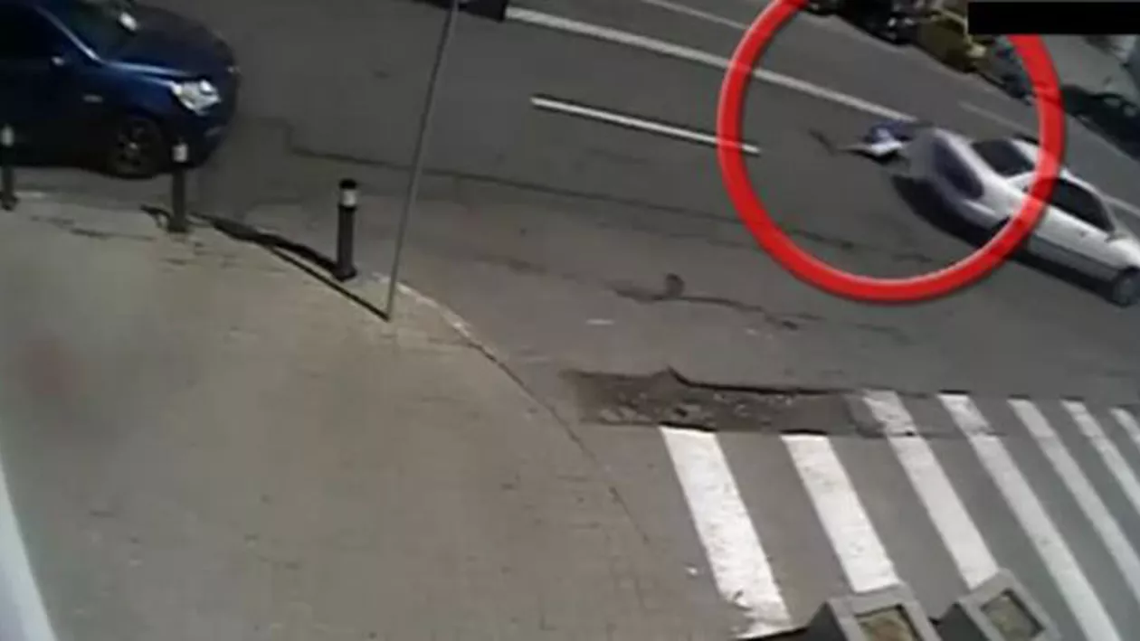 Polițist târât zeci de metri de un șofer ca să scape de amendă