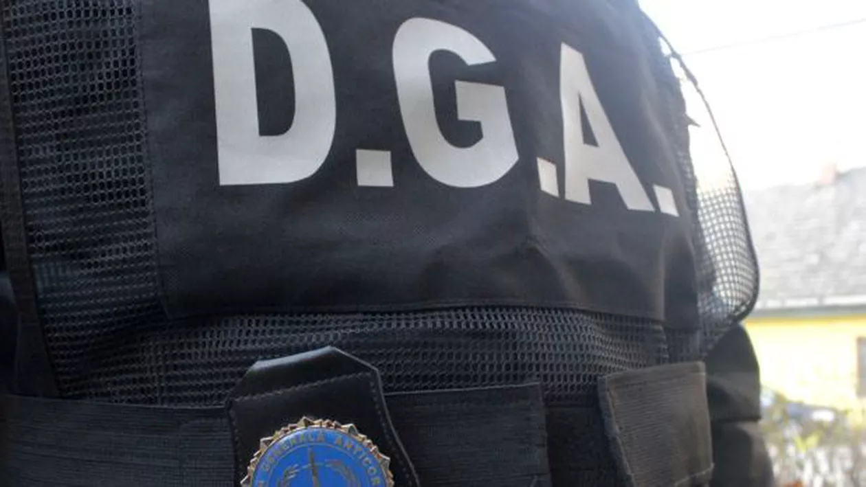 DGA: Un agent de poliție reținut într-un dosar de corupție privind infracțiuni la regimul silvic