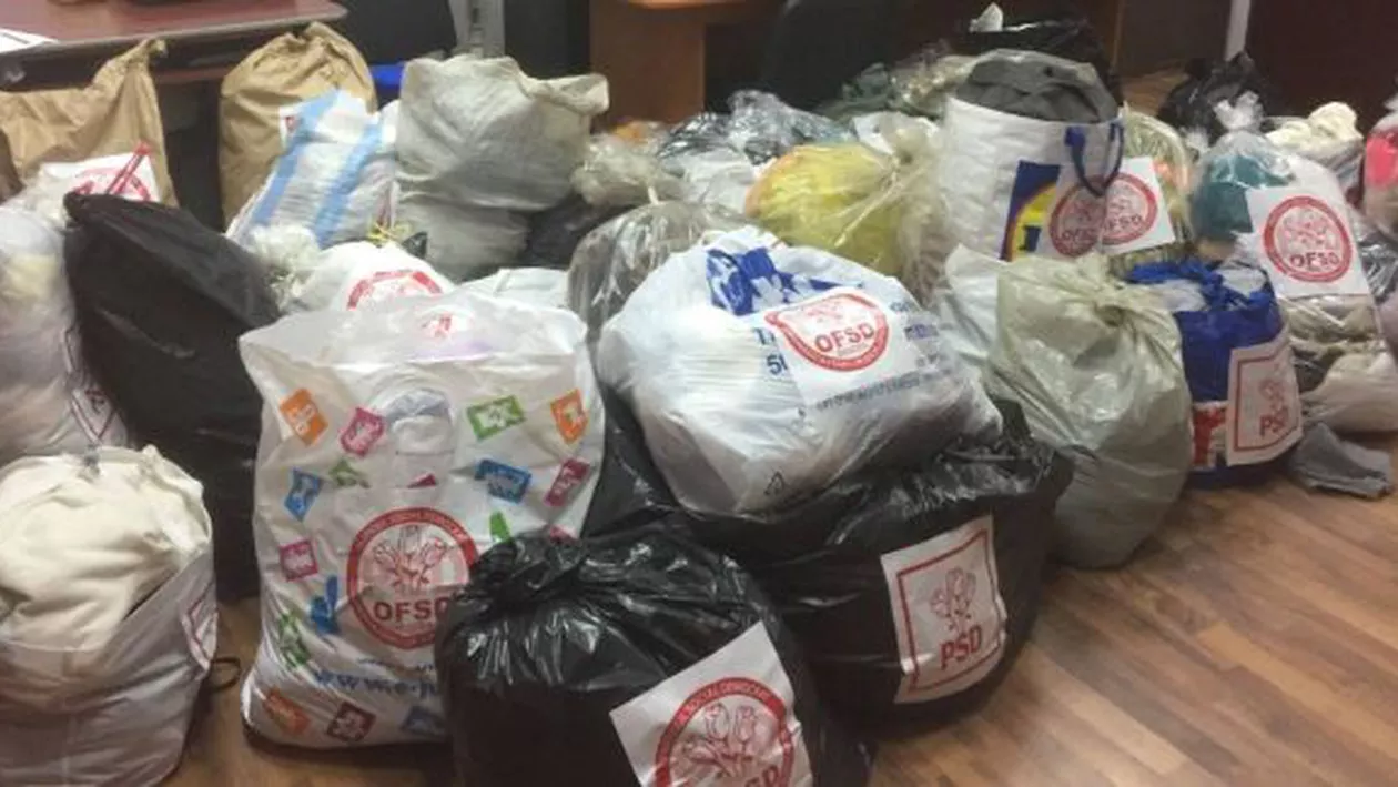 Filantropie cu iz politic la Oradea: Haine donate unor bolnavi, puse în saci cu sigla PSD (FOTO)