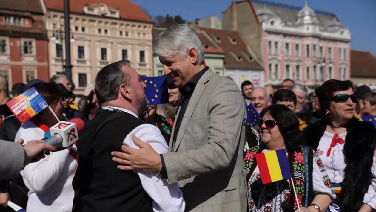 VIRALUL ZILEI! 'Discotecă' Teodorovici, cu pantofi sport Louis Vuitton, care costă cam cât 2-3 salarii minime nete pe economie, în fața alegătorilor din Brașov (FOTO)