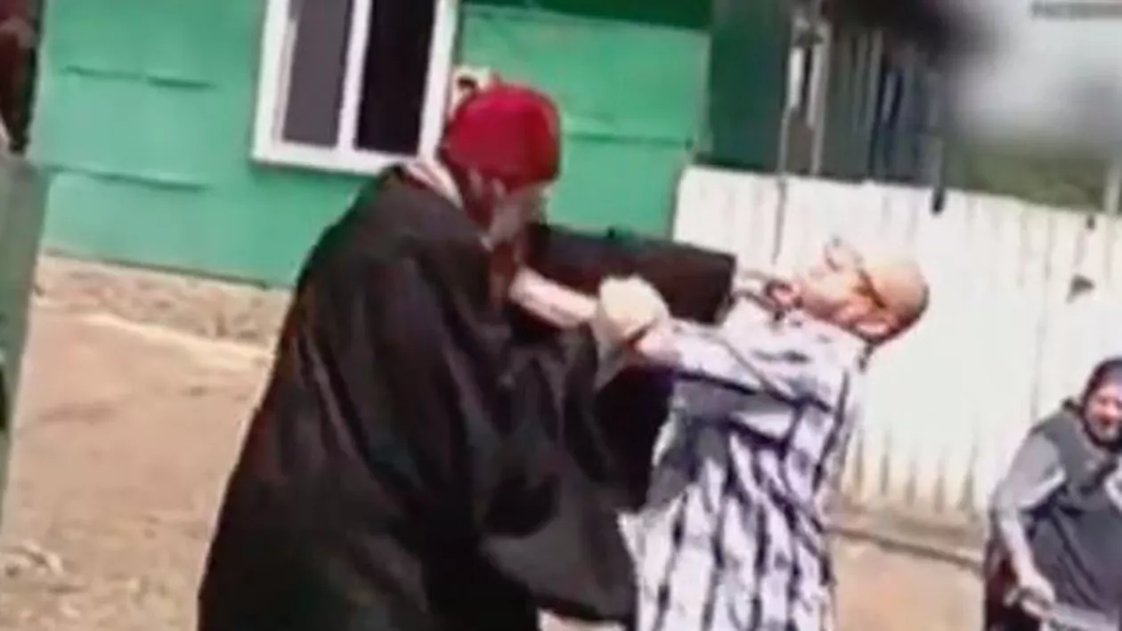 Un preot rupt de beat a făcut ravagii la o înmormântare (VIDEO)