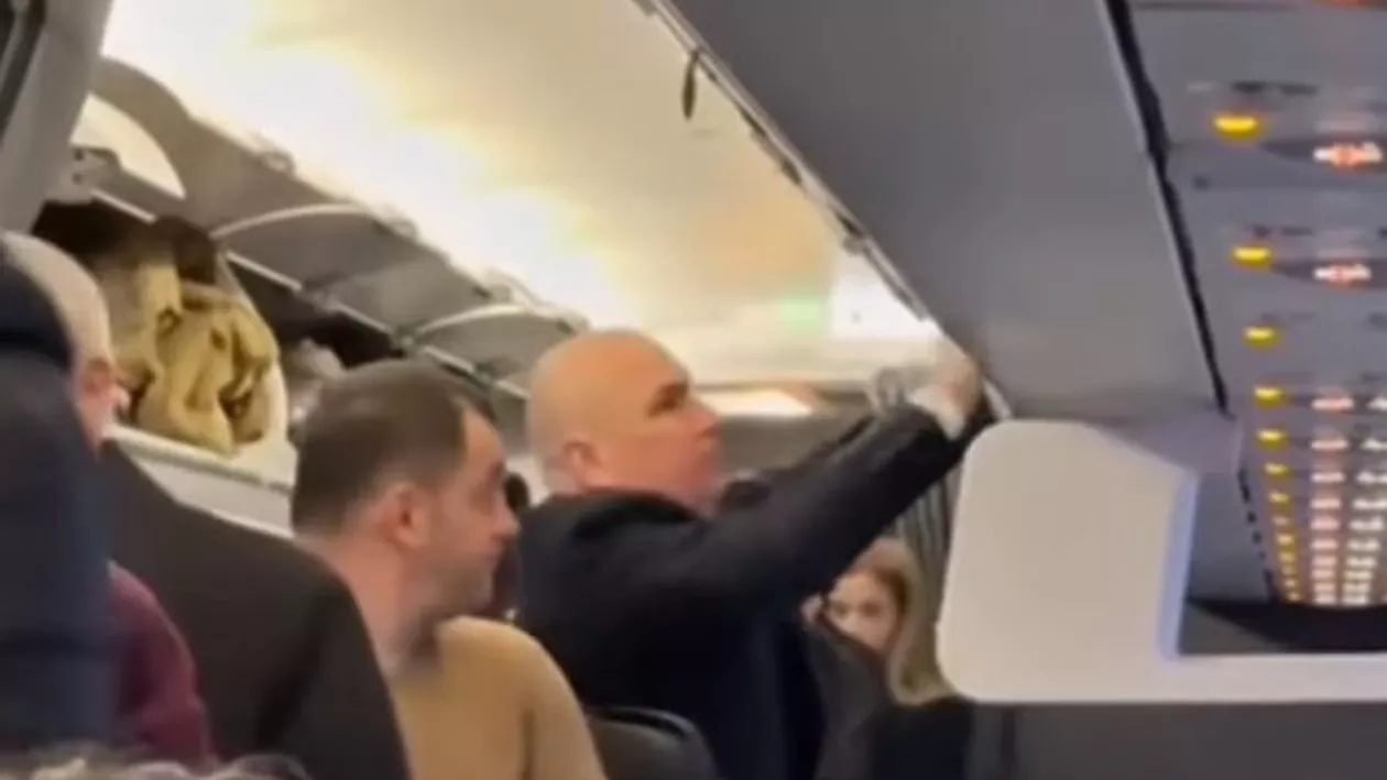 Ilie Bolojan a zburat la Londra cu un avion de linie, la clasa economic (VIDEO)