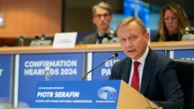 Comisarul european pentru Buget se va întâlni cu Ilie Bolojan și Marcel Ciolacu, la București