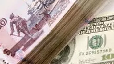 Partidul Rusia Unită vrea să interzică tranzacţiile în dolari americani