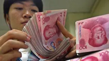 China amenință supremația dolarului american pe piața internațională