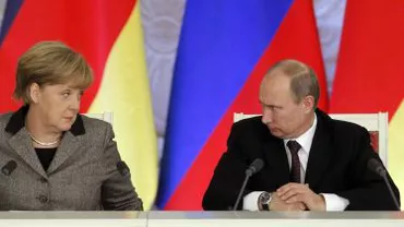 Angela Merkel i-a cerut lui Vladimir Putin să ajute la eliberarea inspectorilor OSCE