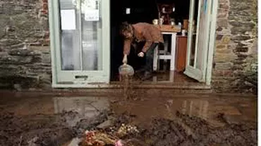 Sute de gospodării din Olt și Dolj au fost inundate în urma ploilor puternice