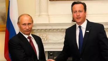 Președintele rus Vladimir Putin și premierul britanic David Cameron s-au întâlnit la Paris