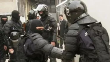 Percheziții la Penitenciarul Giurgiu și în Capitală, la persoane bănuite de înșelăciuni prin telefon