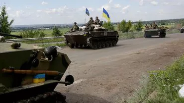 Militarii ucraineni se luptă cu un batalion de tancuri rusești, pe aeroportul din Lugansk