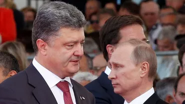 Vladimir Putin şi Petro Poroşenko au convenit să continue dialogul în vederea păcii