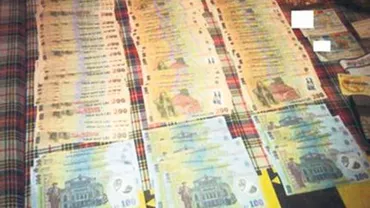 Fabrică de bani falși, descoperită de DIICOT la Hunedoara: Peste 100 de bancnote de 200 de lei, introduse pe piață