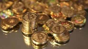 Prima tranzacție din lume cu moneda virtuală Mcoin, realizată la Arad