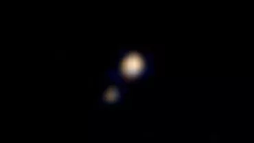 Sonda New Horizons a transmis prima fotografie color a planetei Pluto