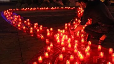 6.619 candele roșii vor fi aprinse în Parcul Herăstrău, în memoria celor care au murit din cauza SIDA în România