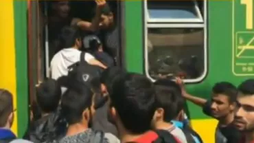 Situație de criză în Ungaria: Mii de imigranți refuză să meargă în tabere (VIDEO)