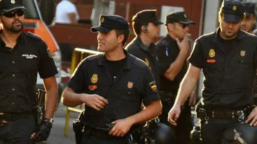 Rețea mafiotă care exploata muncitori români, anihilată de polițiștii spanioli