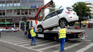 Veşti proaste pentru şoferi: Guvernul va elabora un regulament de ridicare a mașinilor parcate neregulamentar (VIDEO)