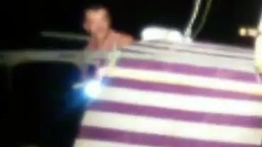 Operaţiune spectaculoasă pe Marea Neagră! Un bărbat din Belarus care voia să ajungă în America de Sud cu o barcă improvizată, salvat de polițiștii de frontieră (VIDEO)