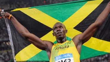 Atletul Usain Bolt a reușit o a treia victorie olimpică consecutivă la 100 de metri