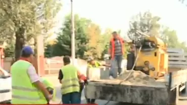 Pregătiri pentru vizita lui Francois Hollande: Autoritățile asfaltează străzile spre Institutul de Fizică Atomică de la Măgurele (VIDEO)