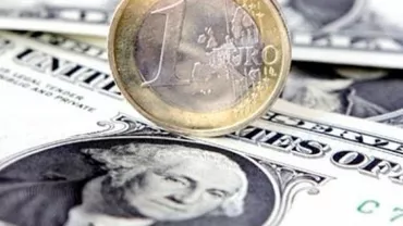 Euro la MAXIMUM ultimei luni față de dolar