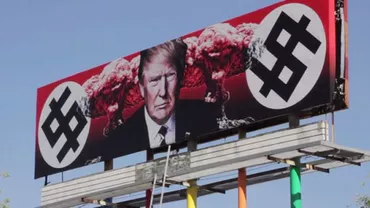Sfidare artistică în SUA: Trump, dolarul NAZIST și exploziile nucleare (VIDEO)