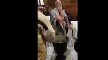 Poliția s-a sesizat cu privire la PREOTUL NEVROTIC care a agresat un bebeluș la botez (VIDEO)