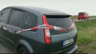 INCREDIBIL! Mașină din România, ciuruită de gloanțe pe un câmp din Germania (VIDEO)
