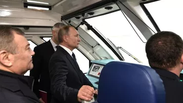 Procedură penală deschisă de Ucraina după ce Vladimir Putin a mers în locomotiva primului tren care a ajuns din Rusia în Crimeea