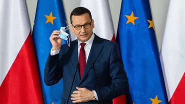 Înainte de finala prezidențialelor din Polonia, premierul Morawiecki transmite electoratului că noul coronavirus e o boală „ca oricare alta”