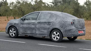 Dacia. Iată Dacia Logan 3 camuflată, cu o caroserie coupe şi motor Euro 7!