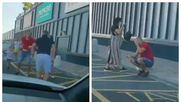 Bătaie în parcarea mallului: Și-au împărțit pumni chiar în fața copiilor (VIDEO)
