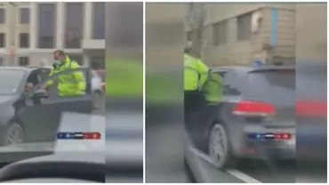 Momente incredibile la Cluj. Un polițist a fost luat pe sus și târât cu mașina de un șofer care a trecut pe roșu (VIDEO)