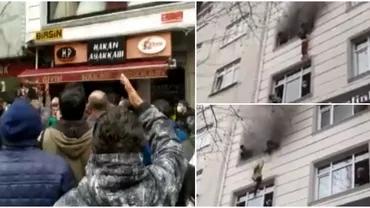 Mai mulți copii au fost aruncați de la etajul 3 de mama lor pentru a-i salva de un incendiu. Vecinii au întins pături pentru a-i ajuta să sară și să-și salveze viețile (VIDEO)