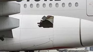 Un avion a zburat 14 ore cu o gaură uriaşă în fuselaj (FOTO)