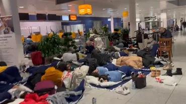 Sute de români, blocați în aeroporturile din Germania. Zborurile au fost amânate sau anulate din cauza vremii (VIDEO)
