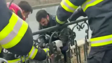 O femeie a amenințat că se sinucide și a sărit în râul Dâmbovița, dar a fost salvată de un polițist (VIDEO)