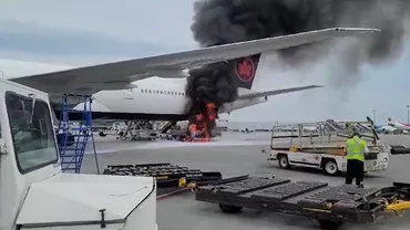 Panică pe aeroportul din Montreal! O camionetă a luat foc sub un avion cu pasageri care tocmai aterizase