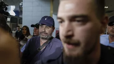 Darius Vâlcov, condamnat la 6 ani de închisoare și fugit în Italia a fost adus în România / Primele imagini de pe Aeroportul Otopeni (FOTO,VIDEO)